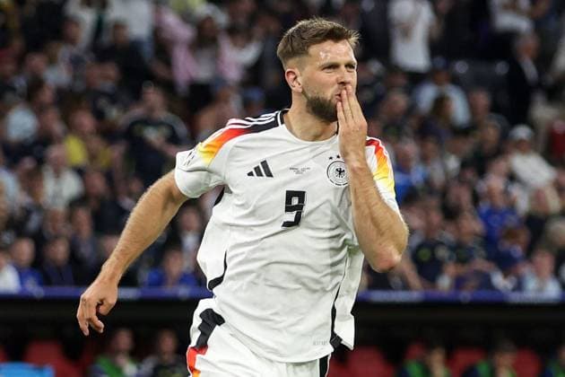Niclas Füllkrug of Germany celebrates scoring the goal for their side with their teammates to make it 4-0 Germany v Scotland, UEFA European Championship, EM, Europameisterschaft 2024, Group A, Football, Munich Football Arena, Munich, Germany, 14 Jun 2024 EDITORIAL USE ONLY No use with unauthorised audio, video, data, fixture lists, club league logos or live services. Online in-match use limited to 120 images, no video emulation. No use in betting, games or single club league player publications. Copyright: xPaulxCurrie Shutterstockx 14523776fj