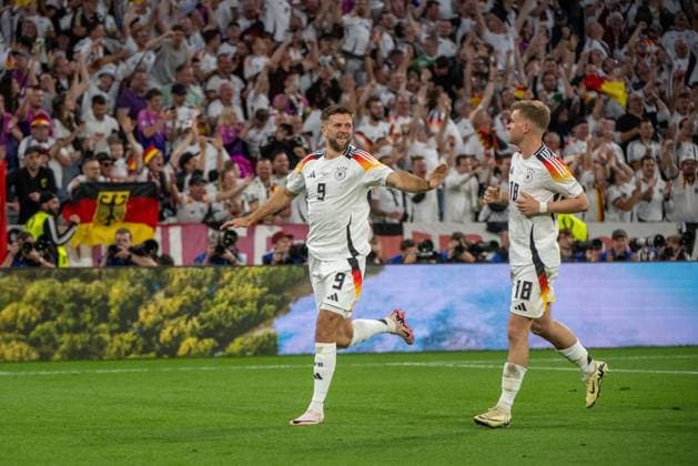 Football, men, season 2023 24, Euro 2024 Group A 1 matchday in Munich, Germany Scotland, f l Niclas Füllkrug Germany , Maximilian Mittelstädt Germany , cheering after scoring 4 0, 14 06 2024, Copyright: xMatthiasxKochx