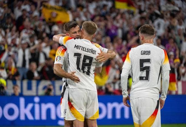 Football, men, season 2023 24, Euro 2024 Group A 1 matchday in Munich, Germany Scotland, f l Niclas Füllkrug Germany , Maximilian Mittelstädt Germany , Pascal Groß Germany , cheering after scoring 4 0, 14 06 2024, Copyright: xMatthiasxKochx