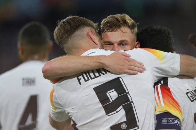 Munich, Bavaria, Germany, 14 06 2024 Allianz Arena European Championship 2024 soccer, Group A, Germany Scotland Opening match of Euro 2024 Niclas Füllkrug hugs Joshua Kimmich and Ilkay Gündogan as they celebrate the goal Copyright: xdtsxNachrichtenagenturx dts_40026