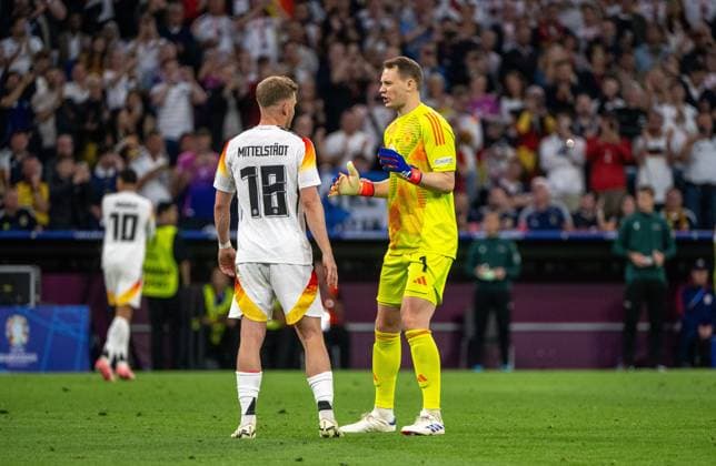 Football, men, season 2023 24, Euro 2024 Group A 1 matchday in Munich, Germany Scotland, v l Maximilian Mittelstädt Germany , goalkeeper Manuel Neuer Germany , 14 06 2024, Copyright: xMatthiasxKochx