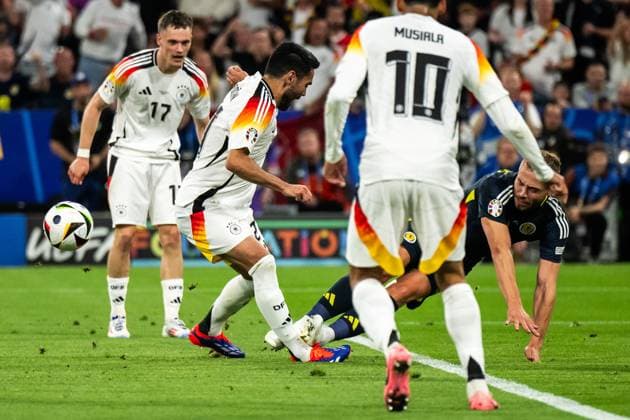 240614 Ilkay Gündogan of Germany and Ryan Porteous of Scotland during the UEFA Euro 2024 Football Championship match between Germany and Scotland on June 14, 2024 in Munich Photo Mathias Bergeld BILDBYRAN code MB MB0933 fotboll football soccer fotballs em europamästerskap em uefa euro uefa european football championship euro 2024 deutschland germany scotland bbeng skottland bbauto  Copyright: MATHIASxBERGELD BB240614MB128