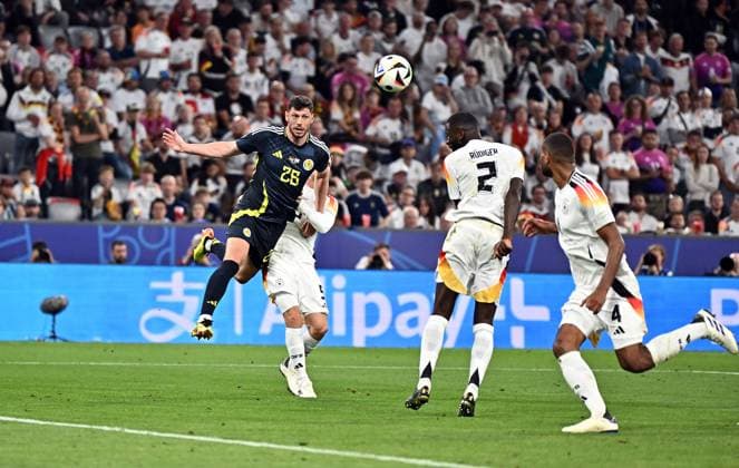 14 06 2024, xscotx, Football EM 2024, Germany Scotland, emspor, v l Scott Fraser Mckenna Team Scotland , Antonio Rüdiger Deutsche Fussball Nationalmannschaft DFB Goal scored, scored the goal to make it 4 1 for schottland eigentor München