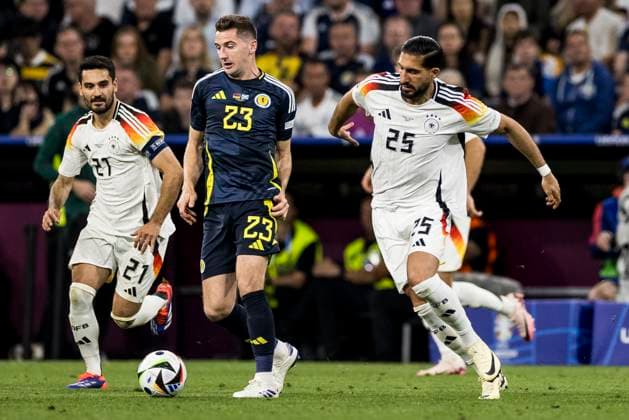 UEFA EURO 2024 Opening match Germany Scotland 14 06 2024 Kenneth McLean Scotland, 23 , Emre Can Germany, 25 UEFA EURO 2024 Opening match Germany Scotland Munich Football Arena, Munich on 14 06 2024 Copyright: xBEAUTIFULxSPORTS Wunderlx
