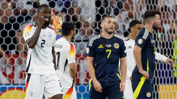 14 06 2024, Football, European Championship, Germany Scotland, GER, Munich, Munich Football Arena, picture from left Antonio Ruediger Germany, 2 and John McGinn Scotland, 7 Copyright: HMBxMedia xHeikoxBecker