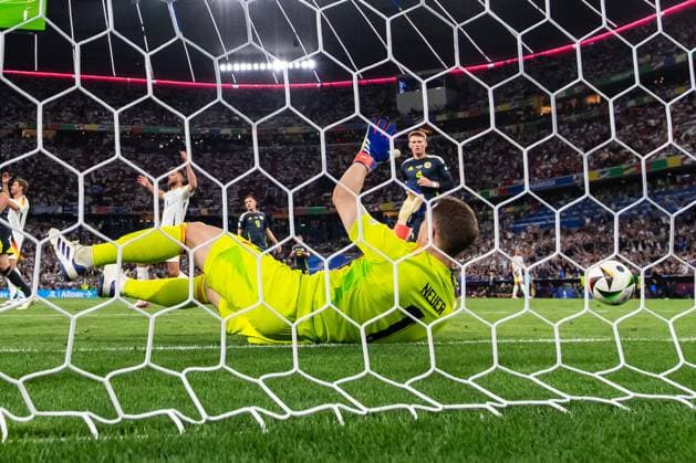 240614 Goalkeeper Manuel Neuer of Germany looks dejected after the 5 1 goal own goal during the UEFA Euro 2024 Football Championship match between Germany and Scotland on June 14, 2024 in Munich Photo Mathias Bergeld BILDBYRAN kod MB MB0933 fotboll football soccer fotballs em europamästerskap em uefa euro uefa european football championship euro 2024 deutschland germany scotland bbeng skottland depp  Copyright: MATHIASxBERGELD BB240614MB152