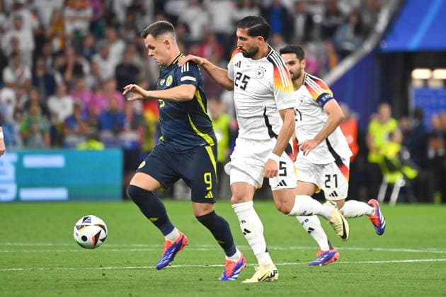 Emre CAN GER , action,duel against Lawrence SHANKLAND Scotland group stage group A Germany GER Scotland SCO 5 1 on 14 06 2024 Football Arena Munich, Football UEFA EURO 2024 GERMANY from 14 06 2024 14 07 2024