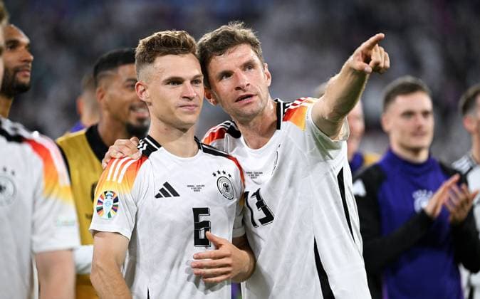 Football, European Championship, EURO 2024, Group A, Allianz Arena Munich Germany Scotland 5 1 Joshua Kimmich GER and Thomas Müller GER cheer, joy, action at the end of the match