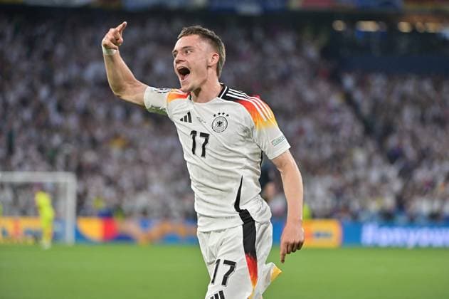 Picture shows goal celebration Germany, Florian Wirtz 17, Germany , 14 06 2024, Munich, Soccer, European Championship, Germany Scotland, EVENT REGULATIONS PROHIBIT ANY USE OF PHOTOGRAPHS AS IMAGE SEQUENCES AND OR QUASI VIDEO xklx