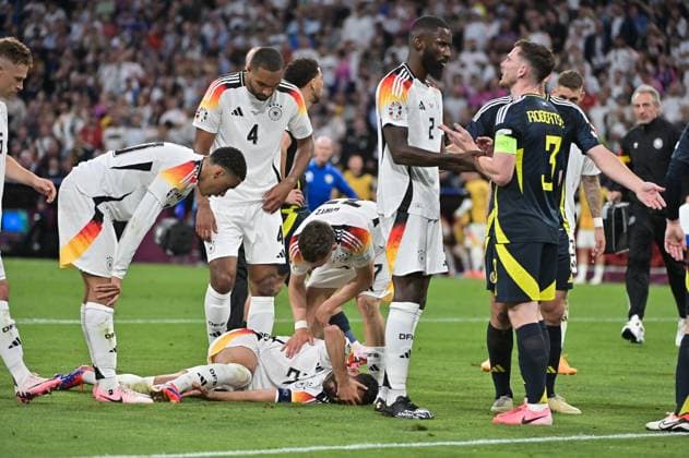 Image shows injury to Ilkay Gündogan 21, Germany , 14 06 2024, Munich, Football, European Championship, Germany Scotland, EVENT REGULATIONS PROHIBIT ANY USE OF PHOTOGRAPHS AS IMAGE SEQUENCES AND OR QUASI VIDEO xklx