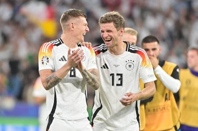 Picture shows Germany cheering after the match, Manuel Neuer 1,Goalkeeper Germany , Toni Kroos 8, Germany , Thomas Müller 13, Germany , 14 06 2024, Munich, Football, European Championship, Germany Scotland, EVENT REGULATIONS PROHIBIT ANY USE OF PHOTOGRAPHS AS IMAGE SEQUENCES AND OR QUASI VIDEO xklx