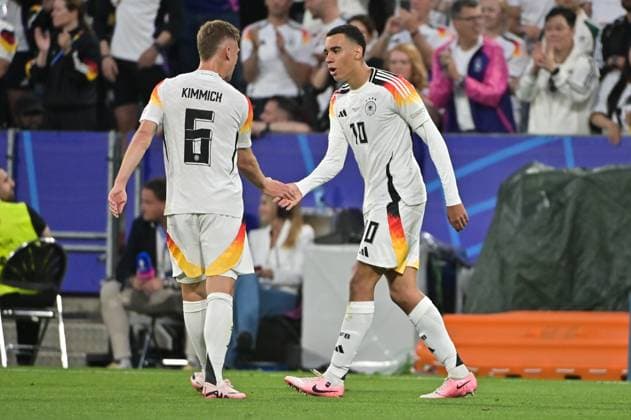Picture shows goal celebration Germany, Joshua Kimmich 6, Germany , Jamal Musiala 10, Germany , 14 06 2024, Munich, Soccer, European Championship, Germany Scotland, EVENT REGULATIONS PROHIBIT ANY USE OF PHOTOGRAPHS AS IMAGE SEQUENCES AND OR QUASI VIDEO xklx