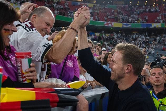 MUNICH, GERMANY - JUNE 14: Germany Head coach Julian Nagelsmann with a Florian Wirtz father after the UEFA EURO, EM, Europameisterschaft,Fussball 2024 group stage match between Germany and Scotland at Munich Football Arena on June 14, 2024 in Munich, Germany.Photo by Sebastian Frej Germany v Scotland: Group A - UEFA EURO 2024 Copyright: xSebastianxFrejx