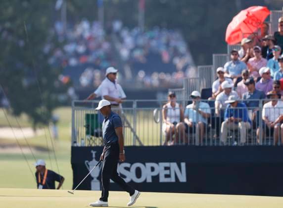 Tiger Woods walks across the fifteenth green during the second round of the 124th U.S. Open golf championship at Pinehurst Resort & Country Club in Pinehurst, N.C. on Friday, June 14, 2024.  NCP20240614790 JOHNxANGELILLO
