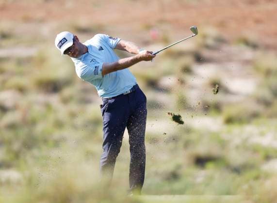 Corey Conners of Canada hits an approach shot from the fairway to the eighth green during the second round of the 124th U.S. Open golf championship at Pinehurst Resort & Country Club in Pinehurst, N.C. on Friday, June 14, 2024.  NCP20240614792 JOHNxANGELILLO