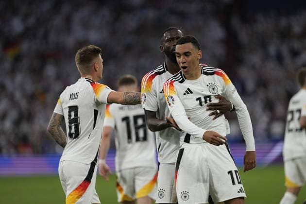 EURO 2024 - Matchday 1: Germany vs. Scotland Jamal Musiala scores and celebrates with Antonio Rudiger and Toni Kroos during the EURO 2024 Day 1 opening match between Germany and Scotland on 14 June 2024, at Munich Football Arena, in Munich, Germany Munich Munich Football Arena Germany Copyright: xAlexandraxFechetex _ADR3869