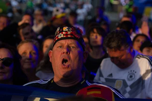 Public View Of Germany V Scotland In Cologne A Scotland fan is singing the anthem as thousands of German and Scotland football fans are gathering at Tanzbrunnen to watch the public viewing of the opening match between Germany and Scotland of UEFA EURO, EM, Europameisterschaft,Fussball 2024 in Cologne, Germany, on June 14, 2024. cologne Germany  Copyright: xYingxTangx originalFilename:tang-notitle240614_npt4Q.jpg