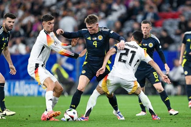 Euro 2024 Germany Scotland on 14 06 2024 at the Allianz Arena in Munich Kai Havertz Germany in a duel against Scott McTominay of Scotland and Ilkay Gündogan Guendogan Germany MT