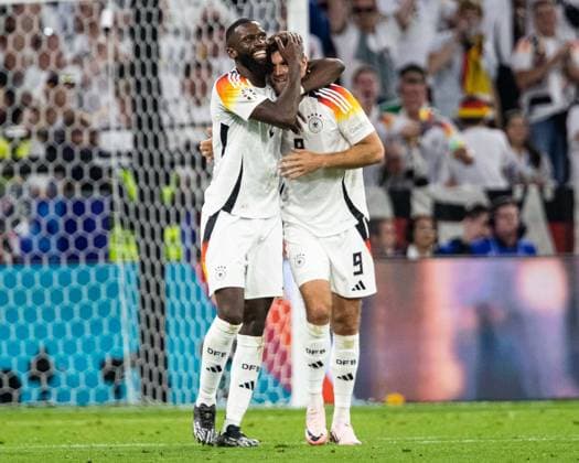 Sport Themen der Woche KW24 Sport Bilder des Tages Antonio Ruediger (Deutschland 02) umarmt Niclas Fuellkrug (Deutschland 09) GER, Germany (GER) vs. Scottland (SCO), Fussball Europameisterschaft, UEFA EURO, EM, Europameisterschaft,Fussball 2024, Gruppe A, 1. Spieltag, 14.06.2024 DFB DFL REGULATIONS PROHIBIT ANY USE OF PHOTOGRAPHS AS IMAGE SEQUENCES AND OR QUASI-VIDEO GER, Germany (GER) vs. Scottland (SCO), Fussball Europameisterschaft, UEFA EURO 2024, Gruppe A, 1. Spieltag, 14.06.2024 Muenchen *** Antonio Ruediger Germany 02 hugs Niclas Fuellkrug Germany 09 GER, Germany GER vs Scottland SCO , European Football Championship, UEFA EURO 2024, Group A, Matchday 1, 14 06 2024 DFB DFL REGULATIONS PROHIBIT ANY USE OF PHOTOGRAPHS AS IMAGE SEQUENCES AND OR QUASI VIDEO GER, Germany GER vs Scottland SCO , European Football Championship, UEFA EURO 2024, Group A, Matchday 1, 14 06 2024 Munich Copyright: xEibner-Pressefoto RogerxBuerkex EP