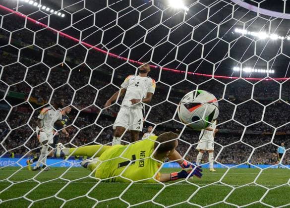 Football, men, season 2023 24, Euro 20204 Group A 1 matchday in Munich, Germany Scotland 5 1 , v l Antonio Rüdiger Germany scores the goal for 4 1 against goalkeeper Manuel Neuer Germany , in the middle Jonathan Tah Germany , 14 06 2024, Copyright: xMatthiasxKochx