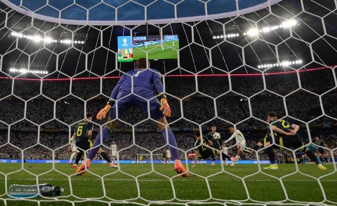 Football, Men, Season 2023 24, Euro 20204 Group A 1 Matchday in Munich, Germany Scotland 5 1 , Jamal Musiala 2 v r , Germany scores the goal for 2 0 against goalkeeper Angus Gunn Scotland , 14 06 2024, Copyright: xMatthiasxKochx