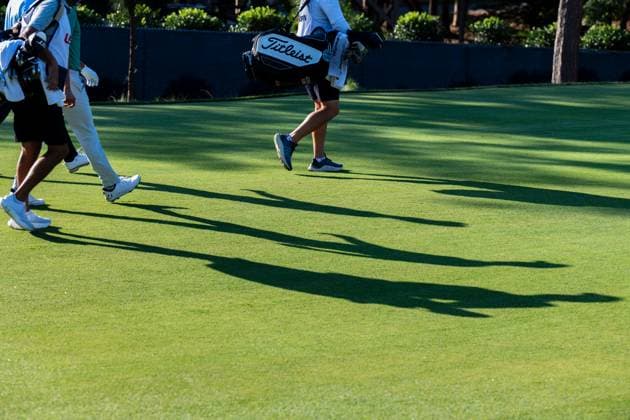 June 14, 2024, Pinehurst, North Carolina, USA: Players and caddies cast shadows on the 10th fairway during Friday s second round for the 124th U.S. Open, June 14, 2024, at Pinehurst Resort & Country Club (Course No. 2) in Pinehurst, North Carolina. Pinehurst USA - ZUMAh97_ 20240614_fap_h97_019 Copyright: xTimothyxL.xHalex