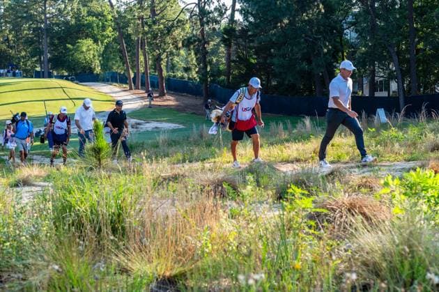 June 14, 2024, Pinehurst, North Carolina, USA: Rory McIlroy of Northern Ireland leads Scottie Scheffler of Dallas, Texas, and Xander Schauffele of San Diego, California, up the 10th fairway during Friday s second round for the 124th U.S. Open, June 14, 2024, at Pinehurst Resort & Country Club (Course No. 2) in Pinehurst, North Carolina. Pinehurst USA - ZUMAh97_ 20240614_fap_h97_035 Copyright: xTimothyxL.xHalex
