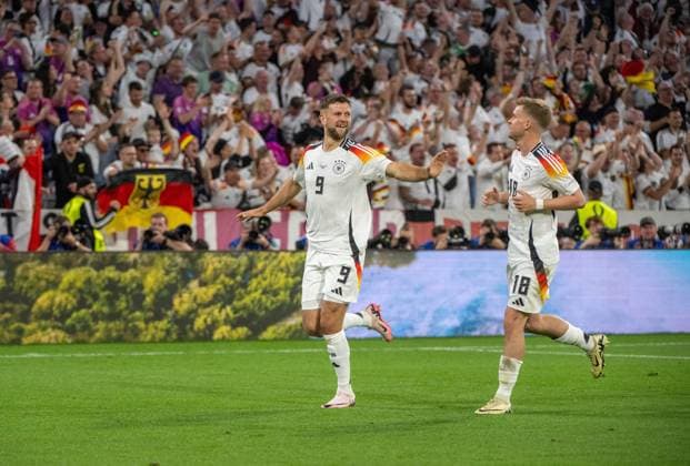 Football, men, season 2023 24, Euro 20204 Group A 1 matchday in Munich, Germany Scotland 5 1 , Niclas Füllkrug Germany , Maximilian Mittelstädt Germany , cheering after scoring 4 0, 14 06 2024, Copyright: xMatthiasxKochx