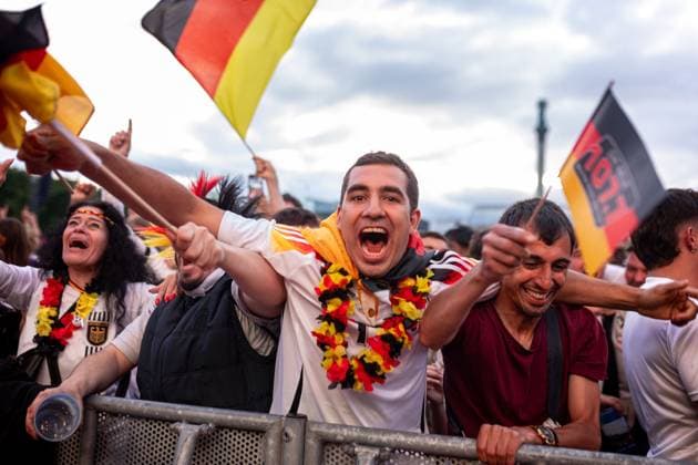 Fans of the German national team cheer and celebrate at the fan festival with public viewing on Stuttgarts Schlossplatz for the first group match against Scotland Stuttgart, EURO2024 Fanfest Schlossplatz, 14 06 2024 Stuttgart Copyright: xDennisxDuddek xEibnerxPressefotox EP_DDK