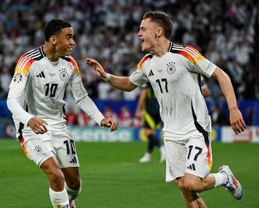 14 06 2024, xpsx, UEFA Euro 2024 preliminary round, Germany Scotland v l celebrate the goal, goal celebration for 1 0 goal scorer Florian Wirtz German national football team DFB , Jamal Musiala German national football team DFB DFL DFB REGULATIONS PROHIBIT ANY USE OF PHOTOGRAPHS as IMAGE SEQUENCES and or QUASI VIDEO Munich Bayern Germany DEU