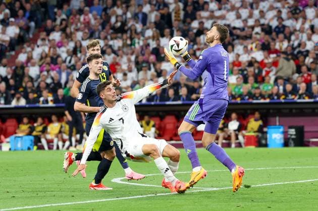 in duel, action, with Kai Havertz 7 Germany , Angus Gunn 1 Scotland , Germany vs Scotland, Football, UEFA Euro 2024, Group stage, 1 Matchday, 14 06 2024 DFB regulations prohibit any use of photographs as image sequences and or quasi video Muenchen Bayern Germany Copyright: xkolbert-press ChristianxKolbertx