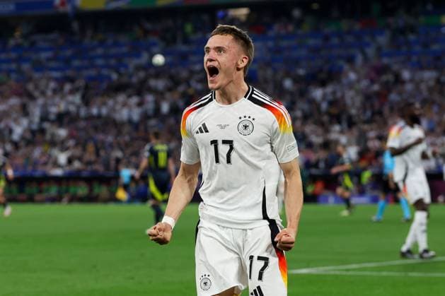 Goal celebration by Florian Wirtz 17 Germany for 1 0, Germany vs Scotland, Football, UEFA Euro 2024, Group stage, 1 Matchday, 14 06 2024 DFB regulations prohibit any use of photographs as image sequences and or quasi video Muenchen Bayern Germany Copyright: xkolbert-press ChristianxKolbertx