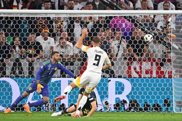 Goal Niclas FUELLKRUG GER for 4 0,action,shot on goal against Kenny MCLEAN Scotland and goalkeeper Angus GUNN Scotland , group stage group A Germany GER Scotland SCO 5 1 on 14 06 2024 Football Arena Munich, Football UEFA EURO 2024 GERMANY from 14 06 2024 14 07 2024