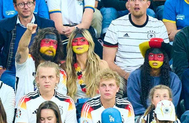 Heidi Klum (GNTM) with husband Tom Kaulitz and four childs Lou (next to her), Johan, Henry and Leni with boyfriend Aris Rachevsky in the group stage match GERMANY - SCOTLAND 5-1 of the UEFA European Championships 2024 on Jun 14, 2024 in Munich, Germany.