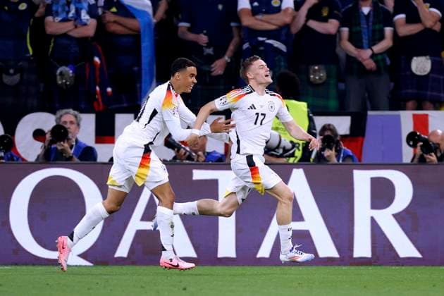 WIRTZ Florian Team Germany cheers after his goal for 1 0 with MUSIALA Jamal UEFA Football EURO 2024 in Germany Opening match Germany Scotland on 14 06 2024in Munich DFL REGULATIONS PROHIBIT ANY USE OF PHOTOGRAPHS as IMAGE SEQUENCES and or QUASI VIDEO Copyright: xLacixPerenyix