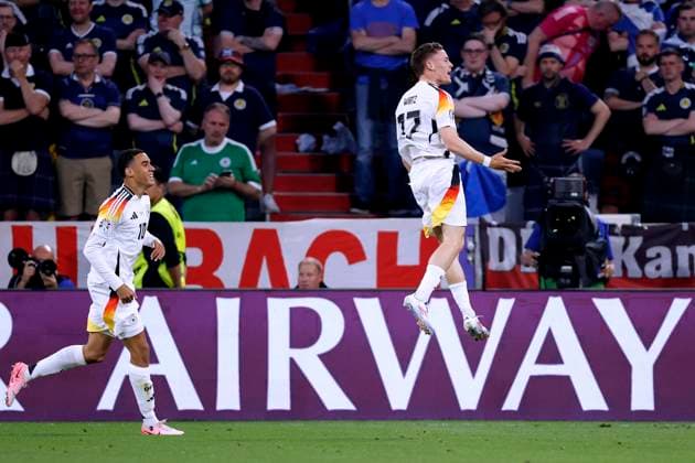 WIRTZ Florian Team Germany cheers after his goal for 1 0 with MUSIALA Jamal UEFA Football EURO 2024 in Germany Opening match Germany Scotland on 14 06 2024in Munich DFL REGULATIONS PROHIBIT ANY USE OF PHOTOGRAPHS as IMAGE SEQUENCES and or QUASI VIDEO Copyright: xLacixPerenyix