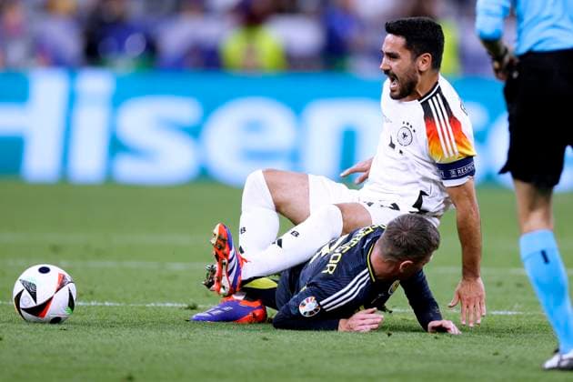GUENDOGAN Ilkay Kapitaen Team Germany with McGREGOR Callum UEFA Football EURO 2024 in Germany Opening match Germany Scotland on 14 06 2024in Munich DFL REGULATIONS PROHIBIT ANY USE OF PHOTOGRAPHS as IMAGE SEQUENCES and or QUASI VIDEO Copyright: xLacixPerenyix