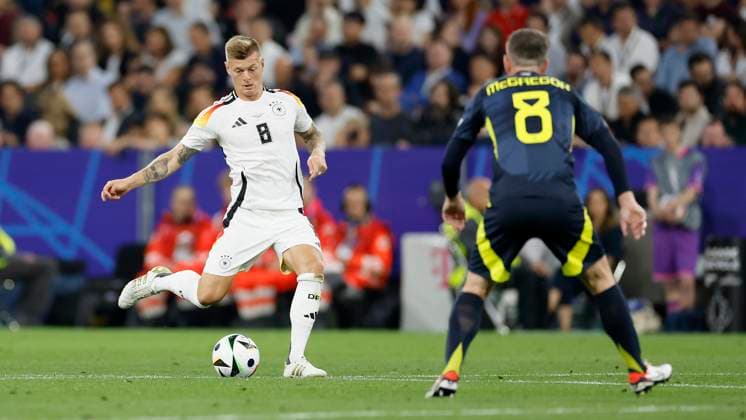 14 06 2024, Football, European Championship, Germany Scotland, GER, Munich, Munich Football Arena, picture from left Toni Kroos Germany, 8 and Callum McGregor Scotland, 8 , Copyright: HMBxMedia xHeikoxBecker
