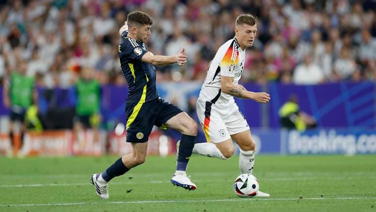 14 06 2024, Football, European Championship, Germany Scotland, GER, Munich, Munich Football Arena, picture from left Ryan Christie Scotland, 11 and Toni Kroos Germany, 8 Copyright: HMBxMedia xHeikoxBecker