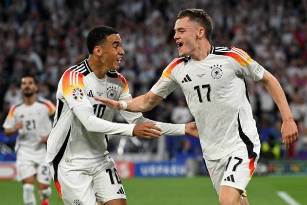Muenchen, Munich Football Arena, 14 06 24, GER, Men, UEFA EURO 2024, Germany Scotland Picture Florian WIRTZ Germany celebrates after his goal for 1 0 with Jamal MUSIALA Germany Only for editorial use UEFA regulations prohibit any use of photographs as image sequences and or quasi video Bayern Germany