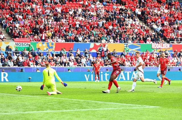 Kwadwo Duah of Switzerland scores to make it 1-0 Hungary v Switzerland, UEFA European Championship, EM, Europameisterschaft 2024, Group A, Football, Cologne Stadium, Cologne, Germany, 15 Jun 2024 EDITORIAL USE ONLY No use with unauthorised audio, video, data, fixture lists, club league logos or live services. Online in-match use limited to 120 images, no video emulation. No use in betting, games or single club league player publications. Copyright: xMichaelxZemanek Shutterstockx 14539265ad