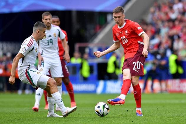 Soccer UEFA EURO 2024 group stage 1 matchday Hungary Switzerland on 15 06 2024 at Köln Stadion in Cologne Adam Nagy Hungary , left Michel Aebischer Switzerland , right xRx