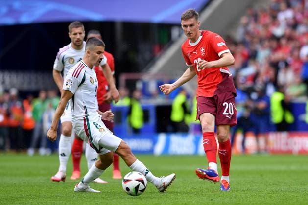 Soccer UEFA EURO 2024 group stage 1 matchday Hungary Switzerland on 15 06 2024 at Köln Stadion in Cologne Adam Nagy Hungary , left Michel Aebischer Switzerland , right xRx
