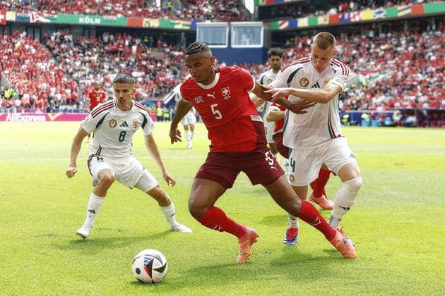 COLOGNE, RheinEnergie Stadium, 15-06-2024 , European Football Championship Euro2024, Group stage match no.2 between Hungary and Switzerland. Hungary player Attila Szalai and Switzerland player Manuel Akanji Hungary - Switzerland (Euro2024)  x25494900x Copyright: