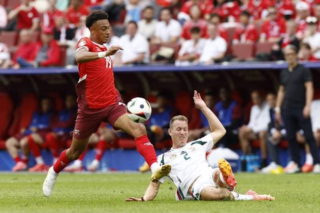 COLOGNE, RheinEnergie Stadium, 15-06-2024 , European Football Championship Euro2024, Group stage match no.2 between Hungary and Switzerland. Hungary player Adam Lang and Switzerland player Dan Ndoye Hungary - Switzerland (Euro2024)  x25494902x Copyright: