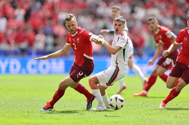15 06 2024, European Football Championship, UEFA EURO 2024, Hungary Switzerland, Group A, Cologne Stadium, f l , Silvan Widmer Switzerland , Adam Nagy Hungary Copyright: HMBxMedia