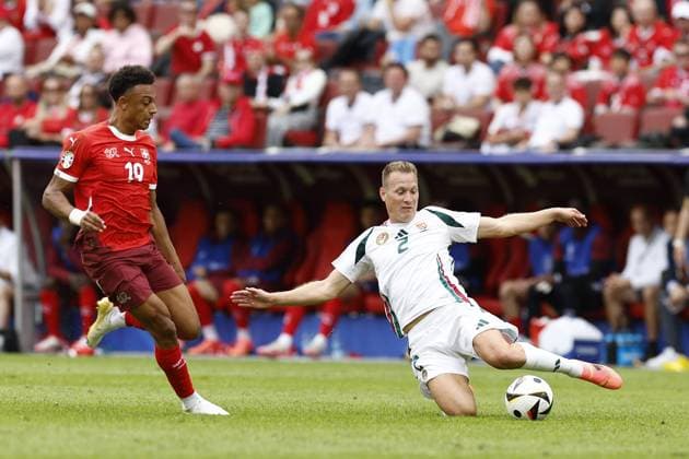 COLOGNE, RheinEnergie Stadium, 15-06-2024 , European Football Championship Euro2024, Group stage match no.2 between Hungary and Switzerland. Hungary player Adam Lang and Switzerland player Dan Ndoye Hungary - Switzerland (Euro2024)  x25494903x Copyright: