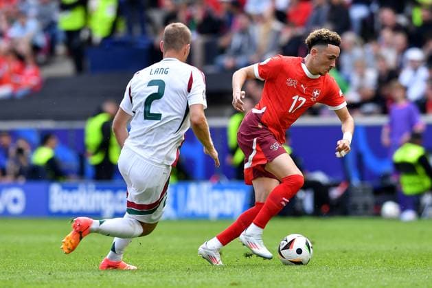 Soccer UEFA EURO 2024 group stage 1 matchday Hungary Switzerland on 15 06 2024 at Köln Stadion in Cologne Adam Lang Hungary , left Ruben Vargas Switzerland , right xRx