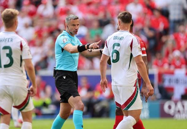15 06 2024, European Football Championship, UEFA EURO 2024, Hungary Switzerland, Group A, Cologne Stadium, f l , Referee Slavko Vincic SVN in conversation with Willi Orban Hungary Copyright: HMBxMedia
