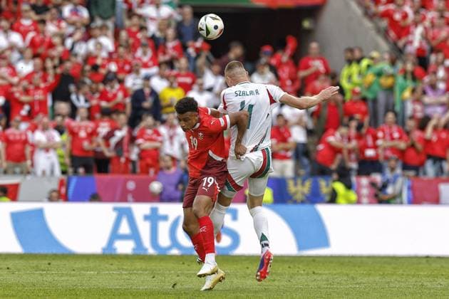 COLOGNE, RheinEnergie Stadium, 15-06-2024 , European Football Championship Euro2024, Group stage match no.2 between Hungary and Switzerland. Hungary player Milos Kerkez and Switzerland player Dan Ndoye Hungary - Switzerland (Euro2024)  x25494977x Copyright: